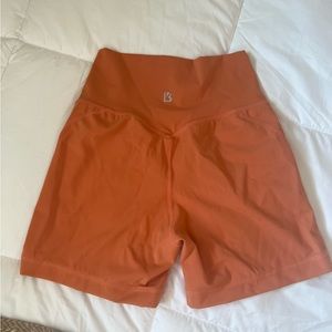 buff bunny orange spandex shorts size small